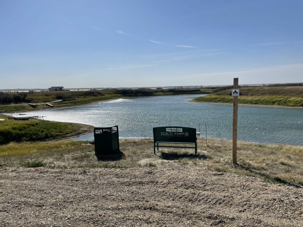 Recreational Trail Bench and Garbage Can at Sunset Beach Lake Diefenbaker